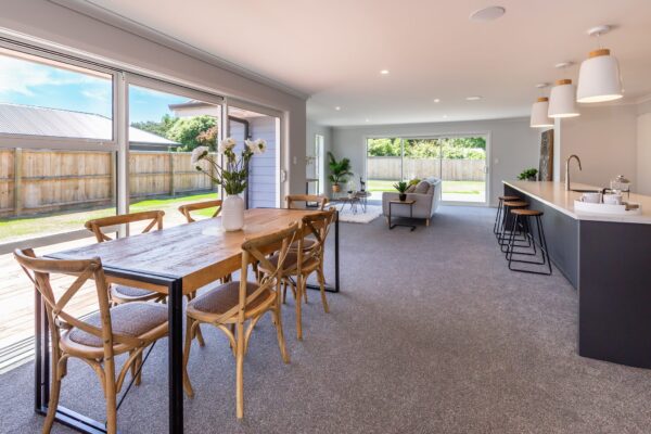 Open plan living area in architectural design and build by Frampton Construction