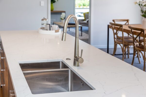 Engineered stone benchtop in new build designer kitchen by Frampton Construction, West Melton