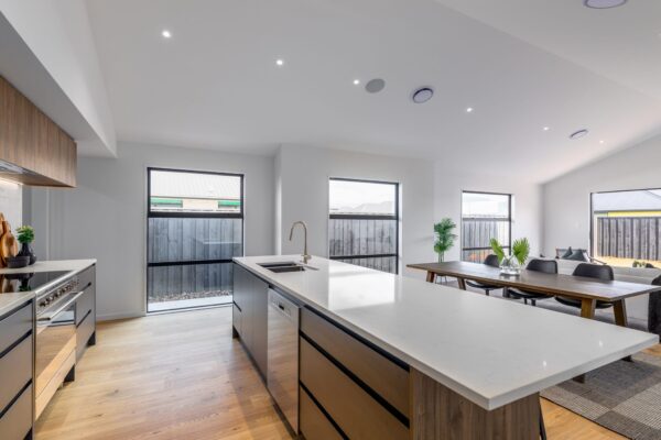 Kitchen and cathedral ceilings in architectural design and build by Frampton Construction